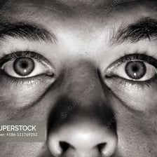 A close-up view of a pair of human eyes.