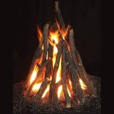 Several logs burning in a campfire.
