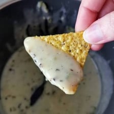 Cheese melting into a soft, gooey texture