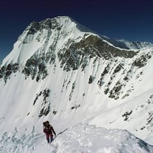 The Tibetan side of Mount Everest with a high-altitude mountain landscape.