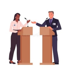 Two people engaged in a face-to-face debate.