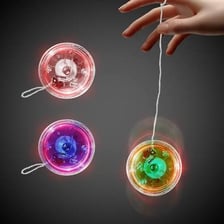 Several colorful yo-yos attached to their strings.