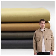 Khaki-colored fabric and clothing made from it