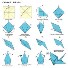 A paper crane made using origami folds.