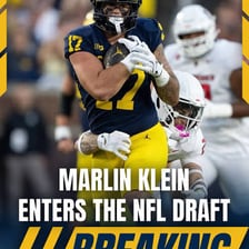 A football player at an NFL draft event, representing the move to professional play.