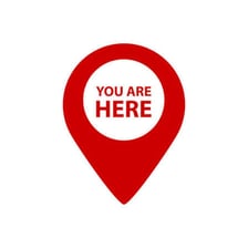 A mall directory map marking the viewer’s current location.