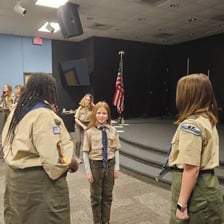 A group of Girl Scouts gathered together
