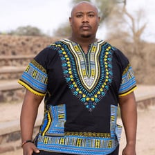 A colorful dashiki, a loose-fitting shirt worn in West African clothing traditions.