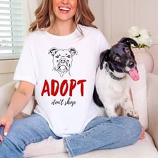 Shelter dog being adopted by a person