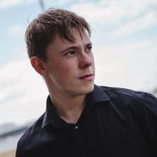 A person looking into the distance while trying to determine what is happening
