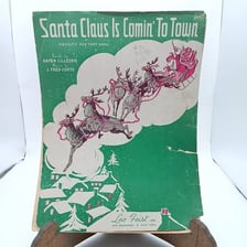 Vintage sheet music for the holiday song “Santa Claus Is Comin’ to Town.”