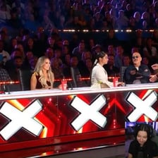 An audience reacting with amazement to a spectacular magic trick