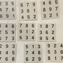 Completed sudoku grid containing the digits one through nine