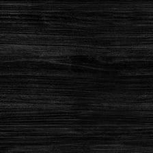 A piece of dark ebony wood showing its grain.