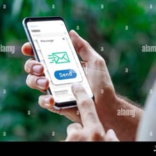 A person using a smartphone to send an informal text message.