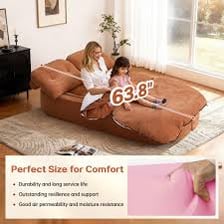 A convertible sofa shown transforming into a flat bed