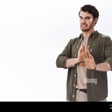 Person looking reluctant and turning away from an activity