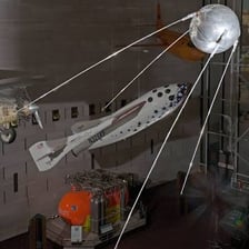 A museum display of a model of the Sputnik 1 satellite.