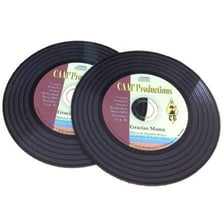Vinyl long-playing records shown with compact discs.