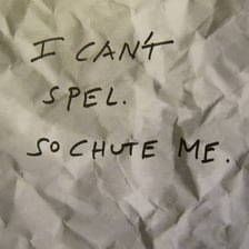 A handwritten word being corrected after a spelling mistake.