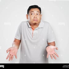 A person shrugging to express uncertainty