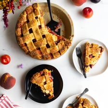 A baked fruit pie with a golden pastry crust.