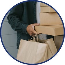 A person carrying packages while running errands