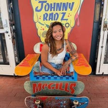 An excited skateboarder celebrating a trick