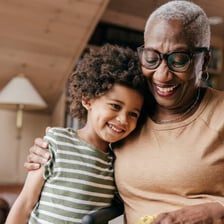 A grandmother spending time with a grandchild.