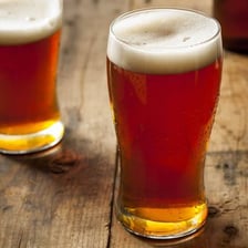 A glass of amber-colored ale.
