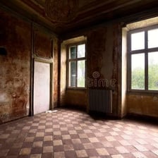 A dim room with worn, dull-looking surfaces.