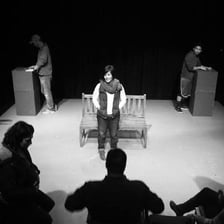 A performer responding to a cue onstage