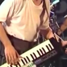 Chick Corea performing at a piano