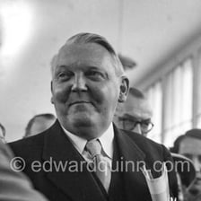 A historical portrait of German statesman Ludwig Erhard.