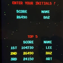 An arcade game high-score screen displaying player initials.