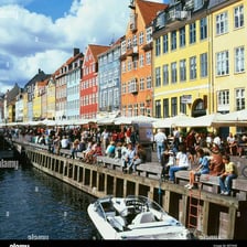 People walking through a street in Copenhagen, Denmark