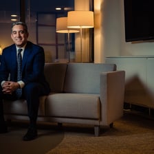 A business executive seated in an office