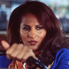 Pam Grier portraying Jackie Brown in the film