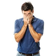Person covering their eyes in reaction to something embarrassing