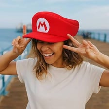 Mario's red cap with a white circle and red M
