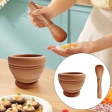 A pestle resting in a mortar