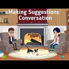 One person suggesting an idea while speaking with another.