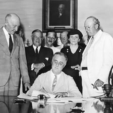 An official reviewing a document representing a veto