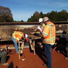 An inspector examining an active construction site.