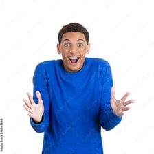 A person reacting with a shocked, stunned expression.