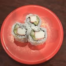 A sliced sushi roll arranged on a plate
