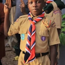 A Boy Scout making an honor pledge.