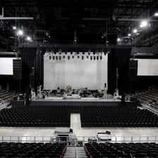 A large indoor arena configured for an event.