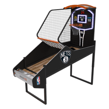 Brooklyn Nets players playing beside a basketball hoop
