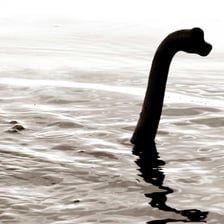 A depiction of the Loch Ness Monster in Loch Ness, Scotland.